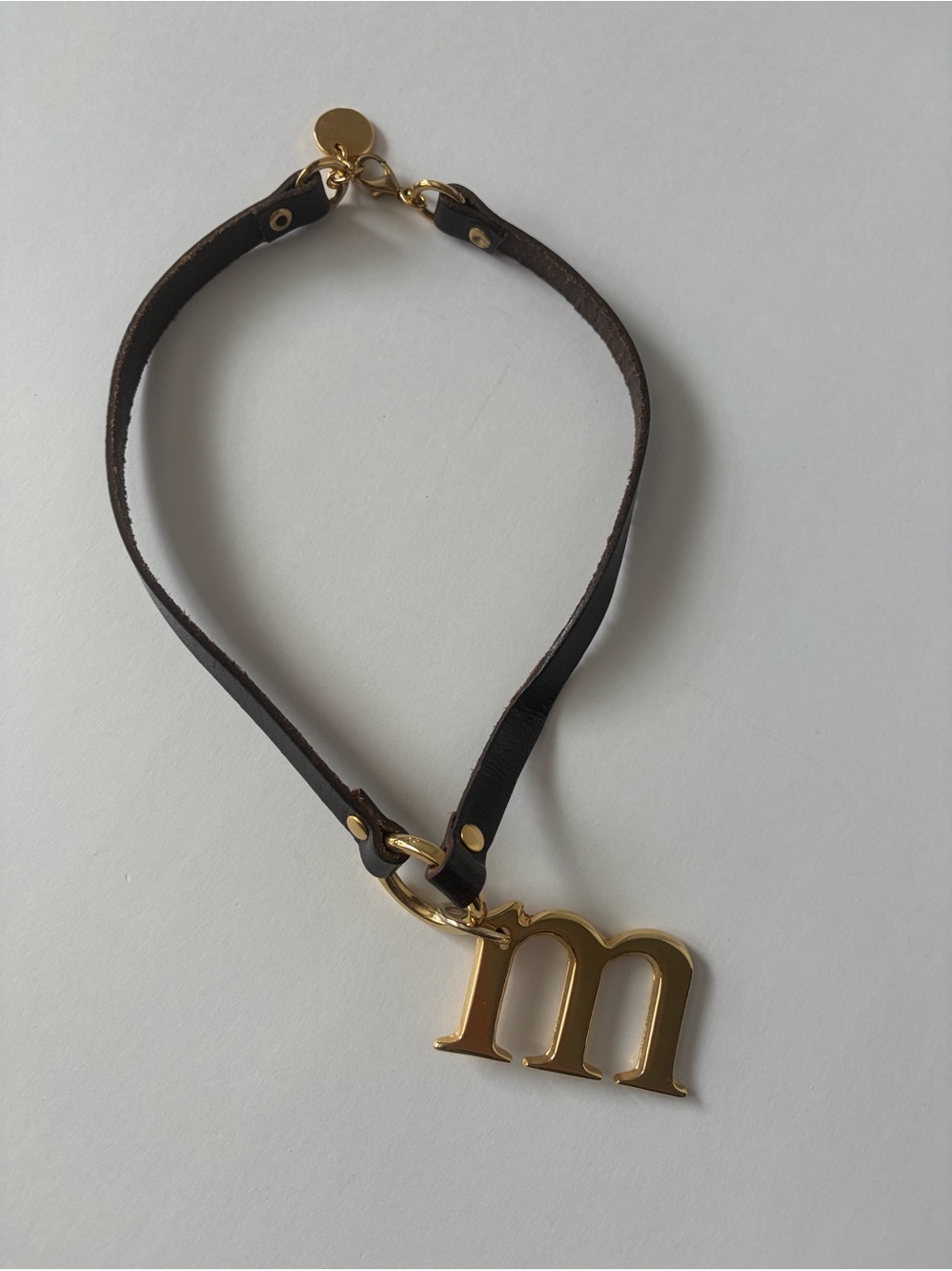 Gabby Pons gold tone and leather m choker necklace